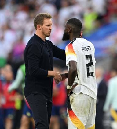 05 07 2024, Football UEFA EURO 2024, quarter-final, Spain Germany, in the Stuttgart Arena Coach Julian Nagelsmann Germany consoles Antonio Rüdiger Germany
