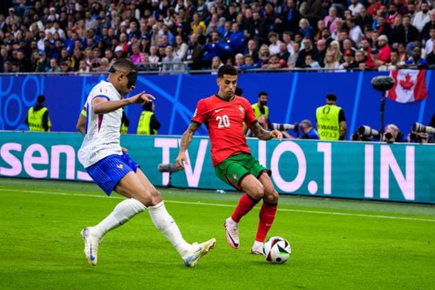 240705 Kylian MbappÃ of France and Joao Cancelo of Portugal during the UEFA Euro 2024 Football Championship Quarterfinal between Portugal and France on July 5, 2024 in Hamburg Photo Jesper Zerman BILDBYRAN kod JZ JZ0551 fotboll football soccer fotballs fotballs em europamästerskap em uefa euro uefa european football championship euro 2024 portugal frankrike france bbeng bbauto  Copyright: JESPERxZERMAN BB240705JZ035