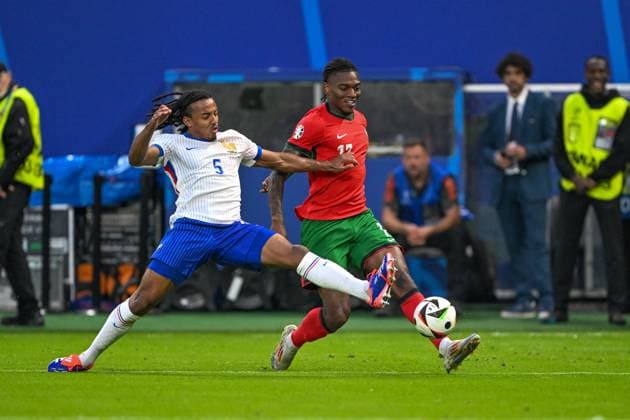 European Championship 2024 Portugal France on 05 07 2024 at the Volksparkstadion in Hamburg Jules KoundÃ 5 of France and William Saliba 17 of France MT