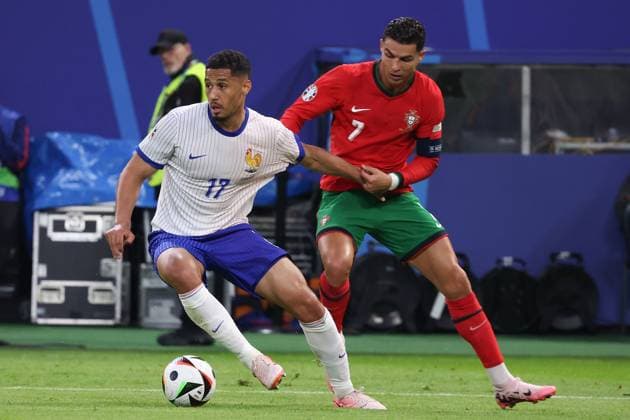 Volksparkstadion, Hamburg UEFA EURO 2024 Germany, quarter-final 5 July 2024 , Portugal France v l , William Saliba France , Cristiano Ronaldo Portugal , duel, action, action, battles for the ball Copyright: JoaquimxFerreira