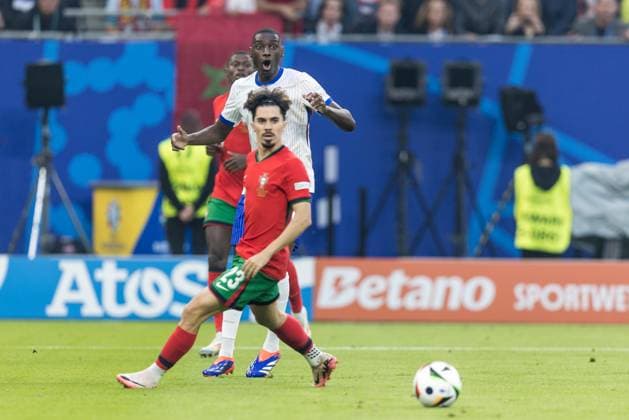 5th July 2024; Volksparkstadion, Hamburg, Germany; Euro 2024 Quarter Final Football, Portugal versus France; Randal Kolo Muani (FRA) and Vitinha (POR)  ActionPlus12664403 FotoxOlimpik