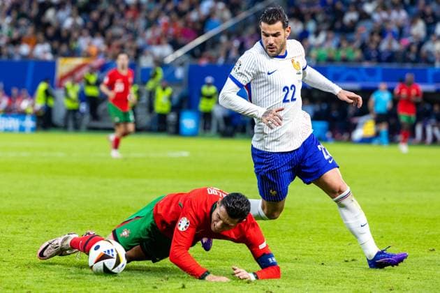 Portugal v France: Quarter-Final - UEFA EURO, EM, Europameisterschaft,Fussball 2024 Cristiano Ronaldo, Theo Hernandez are playing during the UEFA Euro 2024 Quarter-Final match between Portugal v France, at the stadium in Hamburg, Germany, on July 5, 2024. Hamburg Germany  Copyright: xAndrzejxIwanczukx originalFilename:iwanczuk-portugal240705_nprAC.jpg
