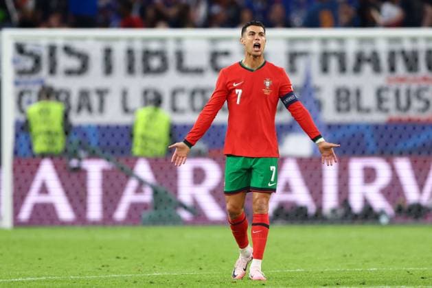Cristiano Ronaldo of Portugal reacts Portugal v France, UEFA European Championship, EM, Europameisterschaft 2024, Quarter Final, Football, Volksparkstadion, Hamburg, Germany, 05 Jul 2024 EDITORIAL USE ONLY No use with unauthorised audio, video, data, fixture lists, club league logos or live services. Online in-match use limited to 120 images, no video emulation. No use in betting, games or single club league player publications. Copyright: xKieranxMcManus Shutterstockx 14571382bt