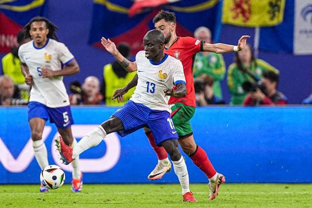 2024-07-05 Portugal v France - Quarter-Final - UEFA EURO, EM, Europameisterschaft,Fussball 2024 HAMBURG, GERMANY - JULY 5: N Golo Kante of France, Bruno Fernandes of Portugal battle for the ball during the Quarter-Final - UEFA EURO 2024 match between Portugal and France at Volksparkstadion on July 5, 2024 in Hamburg, Germany. (Photo by Joris Verwijst BSR Agency) Hamburg Germany Content not available for redistribution in The Netherlands directly or indirectly through any third parties. Copyright: xBSRxAgencyx