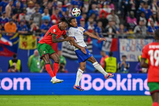 Euro 2024 Portugal France on 05 07 2024 at Volksparkstadion in Hamburg Rafael Leao 17 of Portugal in a duel against Jules KoundÃ 5 of France MT