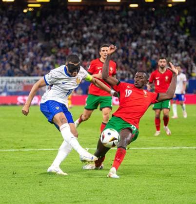 Football, men, season 2023 24, Euro 2024 quarter-finals in Hamburg, Portugal France, v l Kylian Mbappe France , Nuno Mendes Portugal , 05 07 2024, Copyright: xSebastianxRäppold MatthiasxKochx