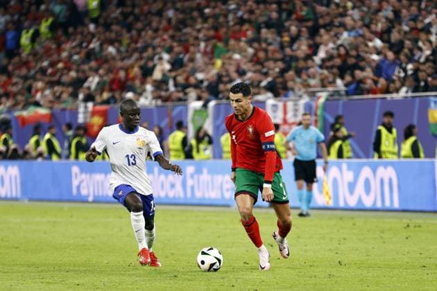 HAMBURG - (l-r) N Golo Kante of France, Cristiano Ronaldo of Portugal during the UEFA EURO, EM, Europameisterschaft,Fussball 2024 quarter-final match between Portugal and France at Volksparkstadion on July 5, 2024 in Hamburg, Germany. ANP Hollandse Hoogte MAURICE VAN STEEN UEFA EURO 2024 2024 xVIxANPxSportx xVanxSteenxFotografiexIVx 502837193 originalFilename: 502837193.jpg
