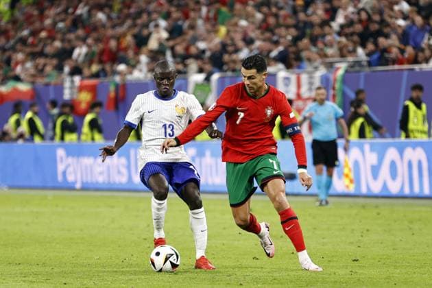 HAMBURG - (l-r) N Golo Kante of France, Cristiano Ronaldo of Portugal during the UEFA EURO, EM, Europameisterschaft,Fussball 2024 quarter-final match between Portugal and France at Volksparkstadion on July 5, 2024 in Hamburg, Germany. ANP Hollandse Hoogte MAURICE VAN STEEN UEFA EURO 2024 2024 xVIxANPxSportx xVanxSteenxFotografiexIVx 502837204 originalFilename: 502837204.jpg