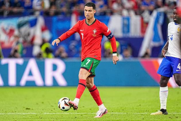 2024-07-05 Portugal v France - Quarter-Final - UEFA EURO, EM, Europameisterschaft,Fussball 2024 HAMBURG, GERMANY - JULY 5: Cristiano Ronaldo of Portugal makes a pass during the Quarter-Final - UEFA EURO 2024 match between Portugal and France at Volksparkstadion on July 5, 2024 in Hamburg, Germany. (Photo by Joris Verwijst BSR Agency) Hamburg Germany Content not available for redistribution in The Netherlands directly or indirectly through any third parties. Copyright: xBSRxAgencyx
