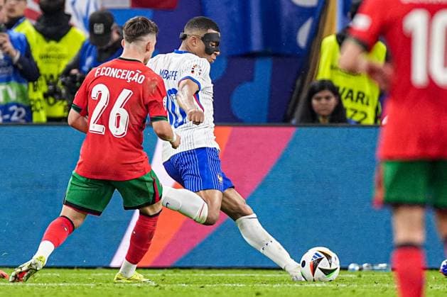 2024-07-05 Portugal v France - Quarter-Final - UEFA EURO, EM, Europameisterschaft,Fussball 2024 HAMBURG, GERMANY - JULY 5: Kylian Mbappe of France shoots during the Quarter-Final - UEFA EURO 2024 match between Portugal and France at Volksparkstadion on July 5, 2024 in Hamburg, Germany. (Photo by Joris Verwijst BSR Agency) Hamburg Germany Content not available for redistribution in The Netherlands directly or indirectly through any third parties. Copyright: xBSRxAgencyx