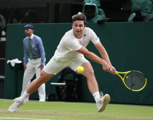 Lawn Tennis - 2024 Wimbledon Championship Mens singles Yannick Sinner (ITA) v MIomir Kecmanovic (SRB) All England Lawn Tennis & Croquet Club - Friday 5th July 2024 MIomir Kecmanovic 