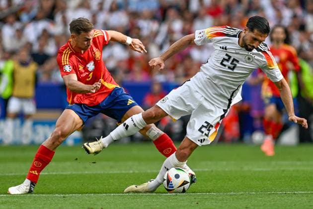 from left in duel Fabian Ruiz 8 Spain Emre Can 25 Germany 05 07 2024 European Football Championship in Germany Spain vs Germany , Neckarpark Stadion, Stuttgart, Baden Württemberg Germany Copyright: xpepphotox xHorstxMauelshagenx pep00321, pep_20240705_hm