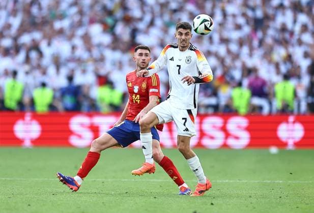 Kai Havertz of Germany and Aymeric Laporte of Spain Spain v Germany, UEFA European Championship, EM, Europameisterschaft 2024, Quarter Final, Football, Stuttgart Arena, Stuttgart, Germany, 05 Jul 2024 EDITORIAL USE ONLY No use with unauthorised audio, video, data, fixture lists, club league logos or live services. Online in-match use limited to 120 images, no video emulation. No use in betting, games or single club league player publications. Copyright: xMichaelxZemanek Shutterstockx 14571380hj