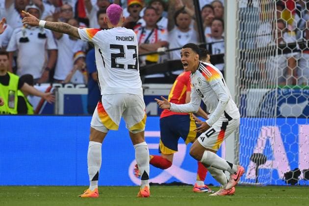 from left Robert Andrich GER nd Jamal MUSIALA GER claim a handball by Marc CUCURELLA ESP no penalty,penalty kick quarterfinal Spain ESP Germany GER 2 1 n V on 05 07 2024,Stuttgart Arena, Soccer UEFA EURO 2024 GERMANY from 14 06 2024 14 07 2024