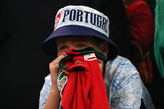 Germany - UEFA EURO, EM, Europameisterschaft,Fussball 2024 - Portugal vs France - 05 07 2024 GERMANY, HAMBURG, JULY 05. A young fan of Portugal cries after defeat in the UEFA EURO 2024 Quarter-finals match between Portugal and France. On July 05, 2024 at Volksparkstadion in Hamburg, Germany. Photo by Manuel Blondeau AOP.Press Hamburg Volksparkstadion Germany Copyright: x ManuelxBlondeau AOP.Pressx AOP20240705 0012