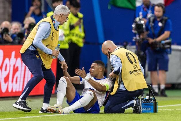 5th July 2024; Volksparkstadion, Hamburg, Germany; Euro 2024 Quarter Final Football, Portugal versus France; Kylian Mbappe (FRA) goes down with an injury to his already injured face  ActionPlus12664495 FotoxOlimpik