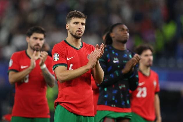 Hamburg, Germany, 5th July 2024. Ruben Dias of Portugal applauds the fans after the UEFA European Championships Quarter Final match at Volksparkstadion, Hamburg. Picture credit should read: Paul Terry Sportimage EDITORIAL USE ONLY. No use with unauthorised audio, video, data, fixture lists, club league logos or live services. Online in-match use limited to 120 images, no video emulation. No use in betting, games or single club league player publications. SPI-3217-0143