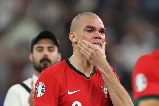 Hamburg, Germany, 5th July 2024. Pepe of Portugal looks dejected after the UEFA European Championships Quarter Final match at Volksparkstadion, Hamburg. Picture credit should read: Paul Terry Sportimage EDITORIAL USE ONLY. No use with unauthorised audio, video, data, fixture lists, club league logos or live services. Online in-match use limited to 120 images, no video emulation. No use in betting, games or single club league player publications. SPI-3217-0144