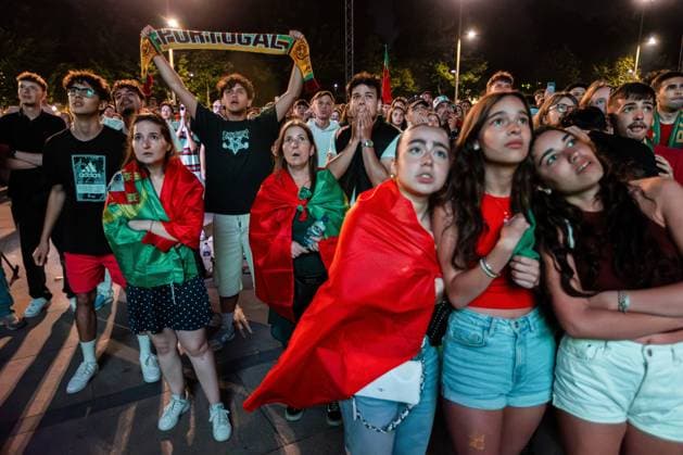 July 5, 2024, Porto, Portugal: Portugal football fans watch the Portugal vs France match on a giant outdoor screen at Amor de Perdicao square in Porto downtown. France wins in penalty shootout, advances to semifinals. Porto Portugal - ZUMAs197 20240705_aaa_s197_299 Copyright: xDiogoxBaptistax
