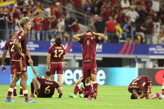 Venezuela™s soccer players react after losing by penalty definition against Canada during the Copa America USA 2024 quarterfinal match at AT T Stadium in Arlington, TX, on July 5, 2024 Canada won and qualified to face Argentina in semifinals in New Jersey on July 9 ARLINGTON UNITED STATES Copyright: xALEJANDROxPAGNIx