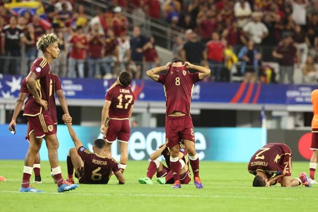 Venezuela™s soccer players react after losing by penalty definition against Canada during the Copa America USA 2024 quarterfinal match at AT T Stadium in Arlington, TX, on July 5, 2024 Canada won and qualified to face Argentina in semifinals in New Jersey on July 9 ARLINGTON UNITED STATES Copyright: xALEJANDROxPAGNIx