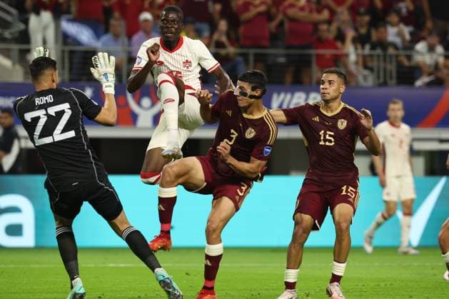 Canada™s forward Liam Millar 2nd L vies for the ball with Venezuela s defenders Yordan Osorio 2nd RI and Miguel Navarro R during the Copa America USA 2024 quarterfinal match between Venezuela and Canada, at AT T stadium in Arlington, TX, on July 5, 2024 ARLINGTON UNITED STATES Copyright: xALEJANDROxPAGNIx