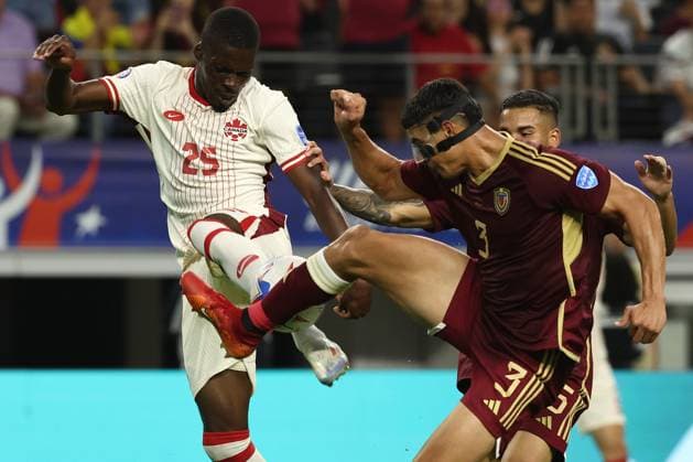Canada™s forward Liam Millar L vies for the ball with Venezuela s defenders Yordan Osorio R during the Copa America USA 2024 quarterfinal match between Venezuela and Canada, at AT T stadium in Arlington, TX, on July 5, 2024 ARLINGTON UNITED STATES Copyright: xALEJANDROxPAGNIx