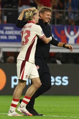 Canada™s American head coach Jesse Alan Marsch R and forward Liam Millar celebrate after defeating Venezuela by penalty kick during the Copa America USA 2024 quarterfinal match at AT T Stadium in Arlington, TX, on July 5, 2024 Canada qualified to face Argentina in semifinals in New Jersey on July 9 ARLINGTON UNITED STATES Copyright: xALEJANDROxPAGNIx