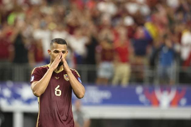 Venezuela s midfielder Yangel Herrera reacts after losing by penalty definition against Canada during the Copa America USA 2024 quarterfinal match at AT T Stadium in Arlington, TX, on July 5, 2024 Canada won and qualified to face Argentina in semifinals in New Jersey on July 9 ARLINGTON UNITED STATES Copyright: xALEJANDROxPAGNIx