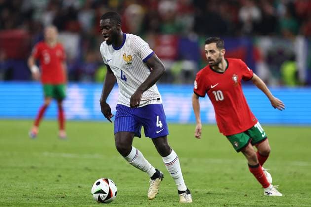 Dayot Upamecano (France) Bernardo Silva (Portugal) during the UEFA EURO, EM, Europameisterschaft,Fussball Germany 2024 match between Portugal 4-5 France at Volkspakstadion on July 05, 2024 in Hamburg , Germany. Noxthirdxpartyxsales  (258789700)