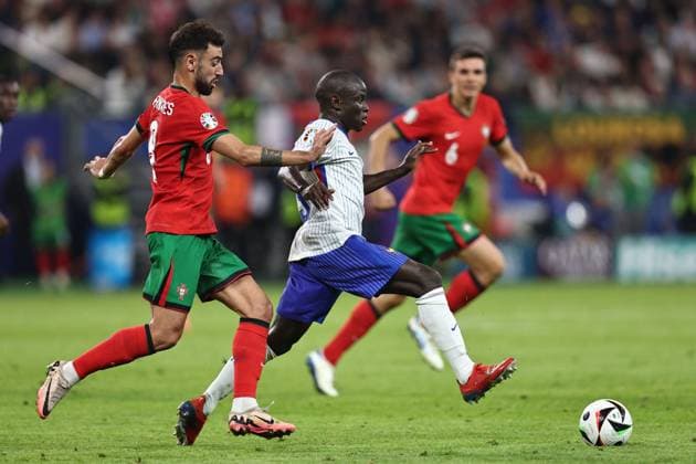 N Golo Kante (France) Bruno Fernandes (Portugal) during the UEFA EURO, EM, Europameisterschaft,Fussball Germany 2024 match between Portugal 4-5 France at Volkspakstadion on July 05, 2024 in Hamburg , Germany. Noxthirdxpartyxsales  (258789860)