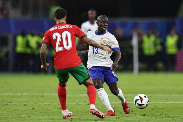 N Golo Kante (France) Joao Cancelo (Portugal) during the UEFA EURO, EM, Europameisterschaft,Fussball Germany 2024 match between Portugal 4-5 France at Volkspakstadion on July 05, 2024 in Hamburg , Germany. Noxthirdxpartyxsales  (258789971)