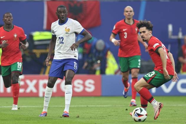 Randal Kolo Muani (France) Vitinha Machado Ferreira (Portugal) during the UEFA EURO, EM, Europameisterschaft,Fussball Germany 2024 match between Portugal 4-5 France at Volkspakstadion on July 05, 2024 in Hamburg , Germany. Noxthirdxpartyxsales  (258790165)