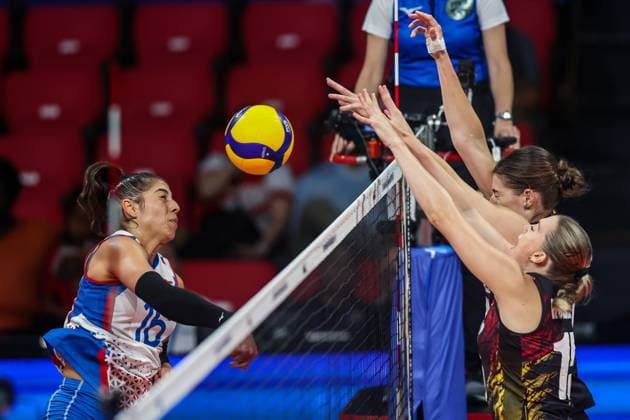 (240706) -- MANILA, July 6, 2024 -- Paola Nicole Santiago Cabrera (L) of Puerto Rico spikes the ball during the match between Puerto Rico and Belgium at the FIVB Women s Volleyball Challenger Cup 2024 in Manila, the Philippines, on July 6, 2024. ) (SP)PHILIPPINES-MANILA-VOLLEYBALL-FIVB WOMEN S CHALLENGER CUP 2024-PUERTO RICO VS BELGIUM ROUELLExUMALI 