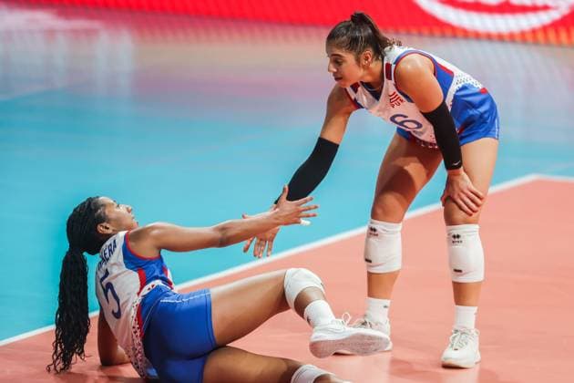 (240706) -- MANILA, July 6, 2024 -- Paola Nicole Santiago Cabrera (R) of Puerto Rico helps her teammate Wilmarie Rivera during the match between Puerto Rico and Belgium at the FIVB Women s Volleyball Challenger Cup 2024 in Manila, the Philippines, on July 6, 2024. ) (SP)PHILIPPINES-MANILA-VOLLEYBALL-FIVB WOMEN S CHALLENGER CUP 2024-PUERTO RICO VS BELGIUM ROUELLExUMALI 