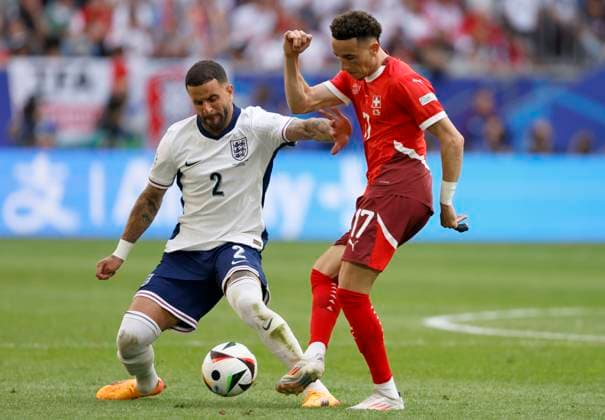 England v Switzerland: Quarter-Final - UEFA EURO, EM, Europameisterschaft,Fussball 2024 Kyle Walker of England and Ruben Vargas of Switzerland challenge during the UEFA EURO 2024 quarter-final match between England and Switzerland at Düsseldorf Arena on July 6, 2024 in Dusseldorf, Germany. Düsseldorf Düsseldorf Arena Germany Germany Copyright: xRichardxSellers Sportsphoto APLx 14044584