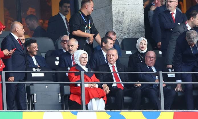 President of Türkiye Recep Tayyip Erdogan with Mesut Özil behind left Netherlands v Turkiye, UEFA European Championship, EM, Europameisterschaft 2024, Quarter Final, Football, Olympiastadion, Berlin, Germany, 06 Jul 2024 EDITORIAL USE ONLY No use with unauthorised audio, video, data, fixture lists, club league logos or live services. Online in-match use limited to 120 images, no video emulation. No use in betting, games or single club league player publications.  Copyright: xKieranxMcManus Shutterstockx 14571393r