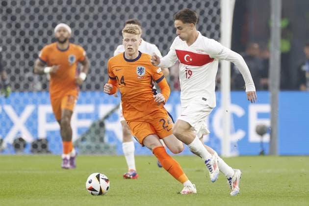 BERLIN, 06-07-2024, Olympia Stadium , European Football Championship Euro2024, Quarter finals match no.47 between Netherlands and Turkiye . Netherlands player Jerdy Schouten, Turkiye player Kenan Yildiz Netherlands - Turkiye (Euro2024)  x25697839x Copyright: