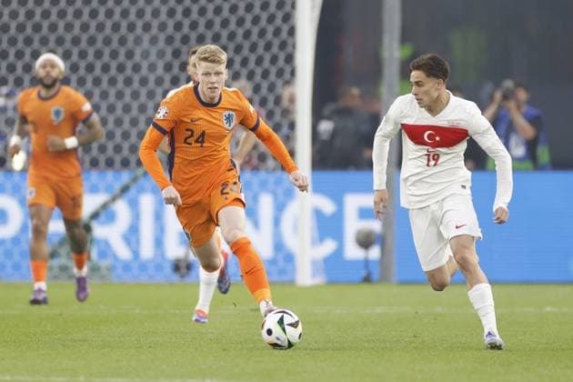 BERLIN, 06-07-2024, Olympia Stadium , European Football Championship Euro2024, Quarter finals match no.47 between Netherlands and Turkiye . Netherlands player Jerdy Schouten, Turkiye player Kenan Yildiz. Netherlands - Turkiye (Euro2024)  x25697958x Copyright:
