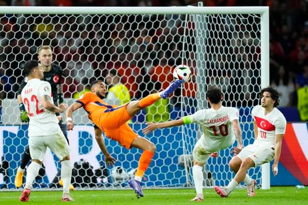 Netherlands v Türkiye: Quarter-Final - UEFA EURO, EM, Europameisterschaft,Fussball 2024 Cody Gakpo Left Winger of Netherland and Liverpool FC shooting to goal during the UEFA EURO 2024 quarter-final match between Netherlands and Türkiye at Olympiastadion on July 6, 2024 in Berlin, Germany. Berlin Germany  Copyright: xJosexBretonx originalFilename:bretonhernandez-netherla240706_npNWM.jpg