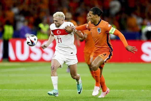 BERLIN, 06-07-2024, Olympia Stadium , European Football Championship Euro2024, Quarter finals match no.47 between Netherlands and Turkiye Netherlands player Virgil van Dijk, Turkiye player Baris Yilmaz. Netherlands - Turkiye (Euro2024)  x25698932x Copyright: