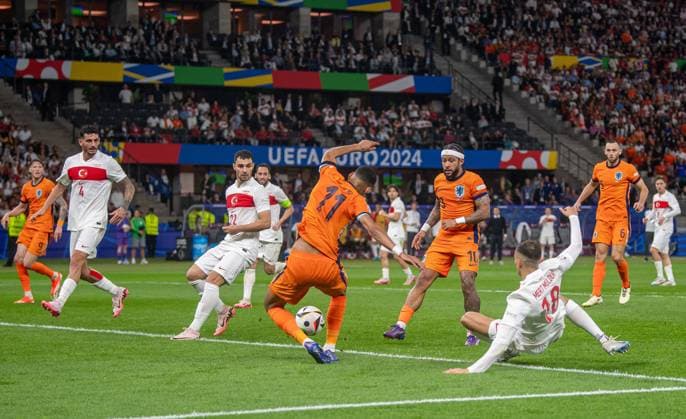 Football, Men, Season 2023 24, UEFA Euro EM 2024, Quarterfinals in Berlin, Netherlands Turkey, Cody Gakpo Netherlands scores the goal for 2 1 against Samet Akaydin Turkey , Kaan Ayhan Turkey and Mert Müldür Turkey , 06 07 2024, Copyright: xSebastianxRäppold MatthiasxKochx