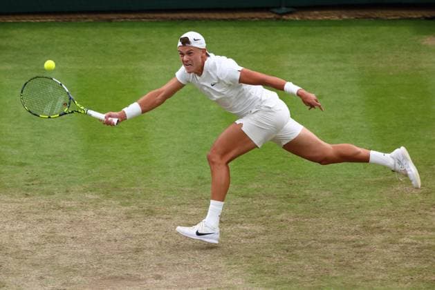 6th July 2024; All England Lawn Tennis and Croquet Club, London, England; Wimbledon Tennis Tournament, Day 6; Holger Rune (DEN) in action during his third round match against Quentin Halys (FRA)  ActionPlus12665265 ShaunxBrooks