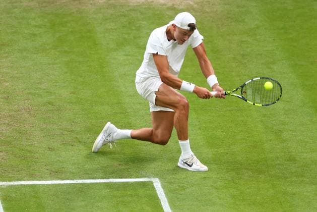 6th July 2024; All England Lawn Tennis and Croquet Club, London, England; Wimbledon Tennis Tournament, Day 6; Holger Rune (DEN) in action during his third round match against Quentin Halys (FRA)  ActionPlus12665267 ShaunxBrooks