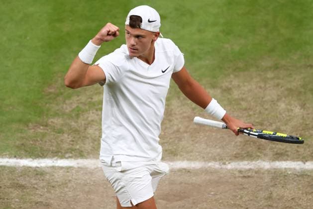 6th July 2024; All England Lawn Tennis and Croquet Club, London, England; Wimbledon Tennis Tournament, Day 6; Holger Rune (DEN) celebrates after he wins the fourth set during his third round match against Quentin Halys (FRA)  ActionPlus12665269 ShaunxBrooks