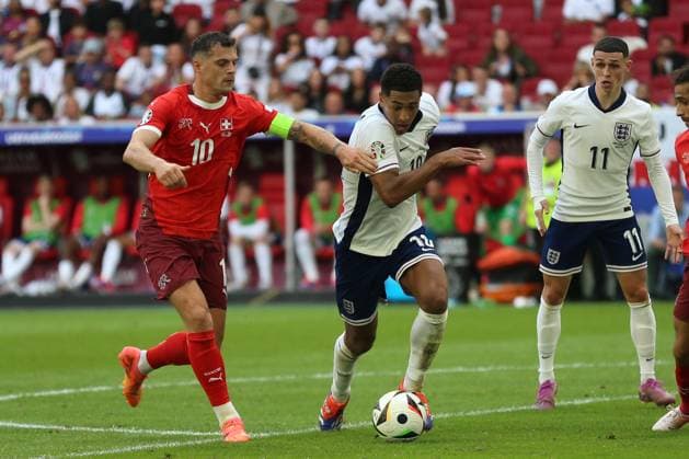 Granit Xhaka Switzerland and Jude Bellingham England in a duel, UEFA EURO 2024 Quarter final, England vs Switzerland, Arena Dusseldorf on July 06, 2024 in Dusseldorf, Germany Photo by Oliver Kaelke DeFodi Images Granit Xhaka Switzerland and Jude Bellingham England battle for the ball, UEFA EURO 2024 Quarter final, England vs Switzerland, Arena Dusseldorf on July 6, 2024 in Dusseldorf, Germany Photo by Oliver Kaelke DeFodi Images Defodi 678 2024 07 06 OK ENGSUI 3140 Defodi-678