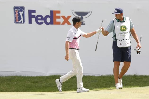 SILVIS, IL - JULY 06: Amateur golfer Luke Clanton gets a fist bump from his caddie after chipping in for a birdie on the 15th hole during the third round of the John Deere Classic on July 6,2024, at the TPC Deere Run in Silvis, Illinois. (Photo by Brian Spurlock Icon Sportswire) GOLF: JUL 06 PGA, Golf Herren John Deere Classic EDITORIAL USE ONLY Icon24070628
