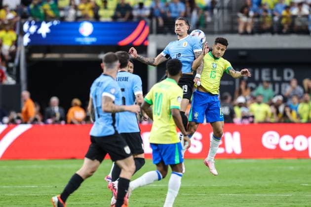 July 06, 2024: Uruguay forward Darwin NoÂºoÂ±ez (19) and Brazil midfielder JooÂ£o Gomes (15) leap for the ball during the CONMEBOL Copa America Quarterfinals match at Allegiant Stadium between Uruguay and Brazil on July 06, 2024 in Las Vegas, NV. CSM. Las Vegas United States of America - ZUMAc04_ 20240706_zma_c04_091 Copyright: xChristopherxTrimx