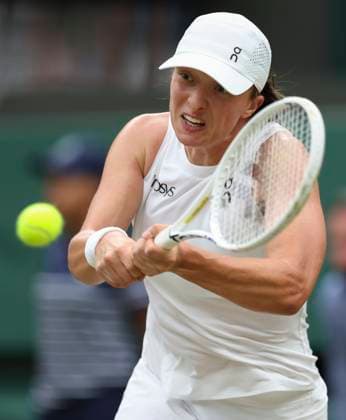(240707) -- LONDON, July 7, 2024 -- Iga Swiatek hits a return during the women s singles third round match between Yulia Putintseva of Kazakhstan and Iga Swiatek of Poland at Wimbledon tennis Championship in London, Britain on July 6, 2024. ) (SP)BRITAIN-LONDON-TENNIS-WIMBLEDON HanxYan 