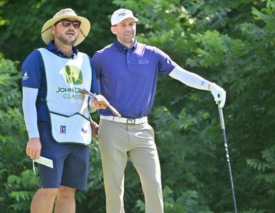 SILVIS, IL - JULY 06: Golfer Ben Silverman talks to his caddie on how to play the 2 hole during the third round of the John Deere Golf PGA, Golf Herren Classic on July 06, 2024, at TPC Deere Run in Silvis IL. (Photo by Keith Gillett Icon Sportswire) GOLF: JUL 06 PGA John Deere Classic EDITORIAL USE ONLY Icon24070627